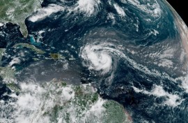 This satellite image provided by the National Oceanic and Atmospheric Administration shows Hurricane Erin forming in the Atlantic Ocean