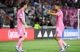 Inter Miami's Lionel Messi, left, celebrates scoring a goal with temmate Jordi Alba, right, in the club's 3-1 MLS home victory over the Los Angeles Galaxy