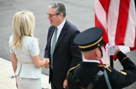 British Prime Minister Keir Starmer is greeted by US Chief of Protocol Monica Crowley (L) upon arrival at the White House South Portico in Washington, DC, on August 18, 2025