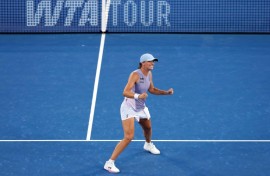 Iga Swiatek celebrates after defeating Jasmine Paolini to win the Cincinnati Open