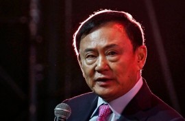 Thailand's former prime minister Thaksin Shinawatra will learn his fate in a royal insult case that could see him jailed, as the political dynasty he founded falters