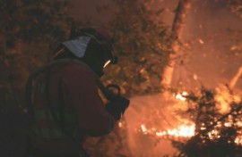 Spanish firefighters battling the fires in Galicia on August 19