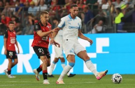 Adrien Rabiot (R) in action for Marseille during their season-opening league defeat at Rennes