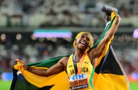 Jamaica's Shelly-Ann Fraser-Pryce celebrates after finishing third in the 100m at the 2023 worlds in Budapest