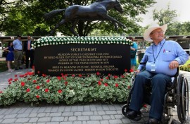 Ron Turcotte, jockey of 1973 Triple Crown winner Secretariat, poses for photos at Belmont Park in 2012