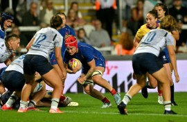 France flanker Charlotte Escudero runs in to score a try during a 24-0 Women's Rugby World Cup Pool D win over Italy in Exeter