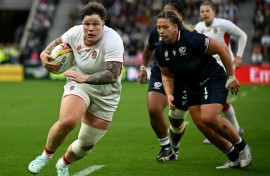 England prop Hannah Botterman runs in the hosts' second try in their 65-7 win over the United States in a Pool A match of the Women's Rugby World Cup at Sunderland's Stadium of Light