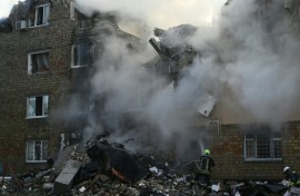 The attack -- one of the deadliest on Kyiv -- blasted a five-storey crater in one apartment block, ripping the building in two