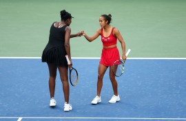Venus Williams (left) celebrates a point with Leylah Fernandez during their US Open doubles defeat to top seeds Taylor Townsend and Katerina Siniakova