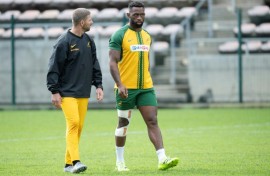 South Africa's Siya Kolisi with his leg in heavy strapping last month in Cape Town