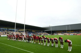 The Japan team and coaches bow to their fans after a 29-21 Women's Rugby World Cup Pool C win over Spain in York