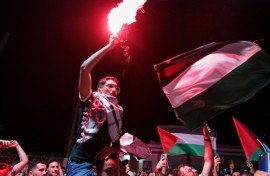 Tunisian protesters shout anti-Israeli slogans and wave Palestinian flags at the Port of Sidi Bou Said near Tunis on September 9, 2025