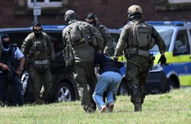 Officials said after the attack that two men and a woman were killed by being stabbed in the neck