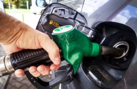 A man fills up his car at a gas station in Moscow on September 8, 2025