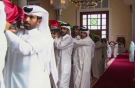 Pallbearers carry the shrouded bodies of the dead inside Doha's Sheikh Mohammed bin Abdul Wahhab Mosque in this Qatar TV image.