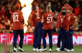 England's Jofra Archer (C) celebrates dismissing South Africa's Marco Jansen during the second T20 at Old Trafford