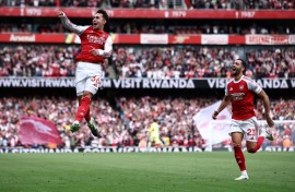 Arsenal's Martin Zubimendi (L) celebrates scoring against Nottingham Forest