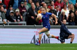France's wing Joanna Grisez runs to score a try during an 18-13 Women’s Rugby World Cup quarter-final win over Ireland at Exeter