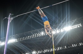 Armand Duplantis clears the bar to set a new world record of 6.30 metres at the third attempt