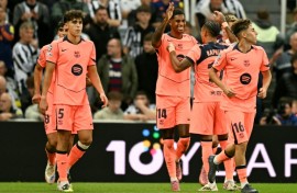 Marcus Rashford takes the acclaim of his Barcelona teammates after scoring one of his two goals against Newcastle United in the Champions League on Thursday