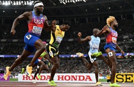 Noah Lyles crosses the line to win the men's 200 metres final at the world championships