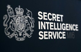 'Our virtual door is open to you,' MI6 chief Richard Moore tells potential spies