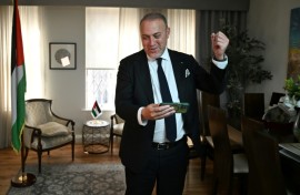 Head of the Palestine Mission to the UK, Husam Zomlot, celebrates after Starmer formally recognised a Palestinian state