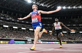 USA's Cole Hocker crosses the finish line ahead of Belgium's Isaac Kimeli