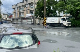 A car stuck in mud in Hualien after the bursting of a barrier lake