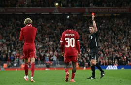 Liverpool forward Hugo Ekitike (L) will be suspended for the Premier League leaders' trip to Crystal Palace on Saturday