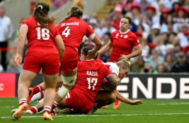 England No 8 Alex Matthews dives to score her second try in the Women's Rugby World Cup final against Canada at Twickenham