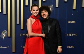 US actress Selena Gomez (L) and her fiance producer Benny Blanco, seen here on the Emmy Awards red carpet, got engaged in December 2024