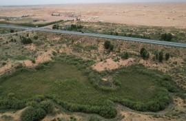 The green zone and the desert landscape in the Kubuqi Desert, in China's northern Inner Mongolia region