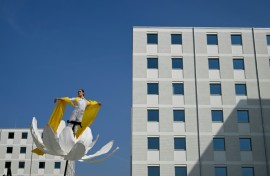 Artists perform in the Olympic and Paralympic Village of the 2026 Milano-Cortina Winter Olympics on the day of its official presentation
