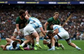 South Africa's scrum-half Cobus Reinach dives to score his team's third try during their 29-27 victory over Argentina