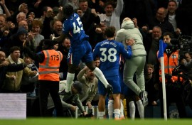 Chelsea boss Enzo Maresca (R) embarked on a jubilant sprint down the touchline to celebrate with his players, earning a red card in the process