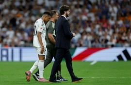 Real Madrid's Kylian Mbappe is in doubt for France's upcoming 2026 World Cup qualifying matches with a right ankle problem
