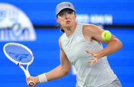 Poland's Iga Swiatek eased past the Czech Republic's Marie Bouzkova during the Wuhan Open tennis tournament