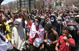 Protesters march in Madagascar capital despite president's promise to resign