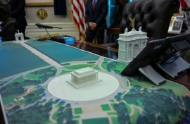 A plan for an arch across from the Lincoln Memorial is seen on the Resolute Desk as US President Donald Trump meets with Finnish President Alexander Stubb and Prime Minister Petteri Orpo in the Oval Office of the White House in Washington, DC, on October 9, 2025.