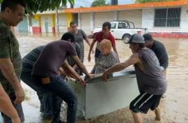 Woman rescued in flooded Veracruz city using fridge as makeshift boat after heavy rains