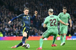 Scott McTominay (L) sealed an important victory for Scotland as he lashed home with his left foot on 84 minutes