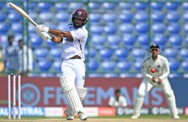 West Indies' John Campbell plays a shot