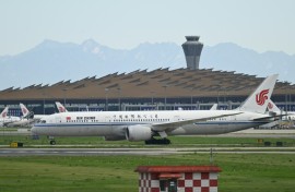 An Air China flight was safely diverted to Shanghai after a battery stowed in a passenger's carry-on luggage caught fire