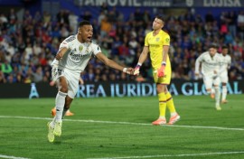 Real Madrid forward Kylian Mbappe (L) returned after an ankle problem kept him out of a France World Cup qualifier