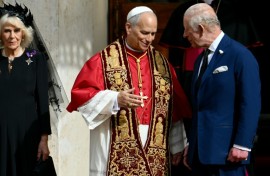 Pope Leo XIV shakes hands with Britain's King Charles III and Queen Camilla in San Damaso courtyard during their state visit to the Vatican
