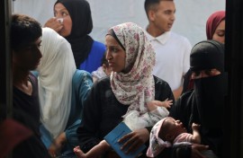 At current rates, it would take a decade to evacuate 15,000 people, including 4,000 children, said Rik Peeperkorn