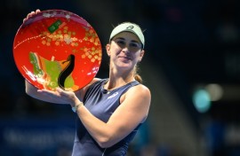 Switzerland's Belinda Bencic beat the Czech Republic's Linda Noskova to win the Pan Pacific Open in Tokyo
