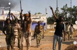 An image from an RSF handout video showing its fighters in Sudan's El-Fasher where they are accused of executing civilians