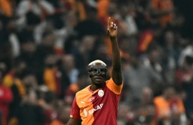 Nigeria striker Victor Osimhen celebrates scoring for Galatasaray in the 2025-26 UEFA Champions League.